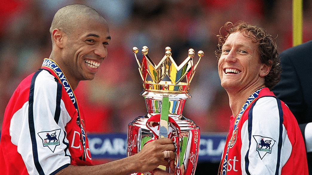 Thierry Henry and Ray Parlour with the Premier League trophy