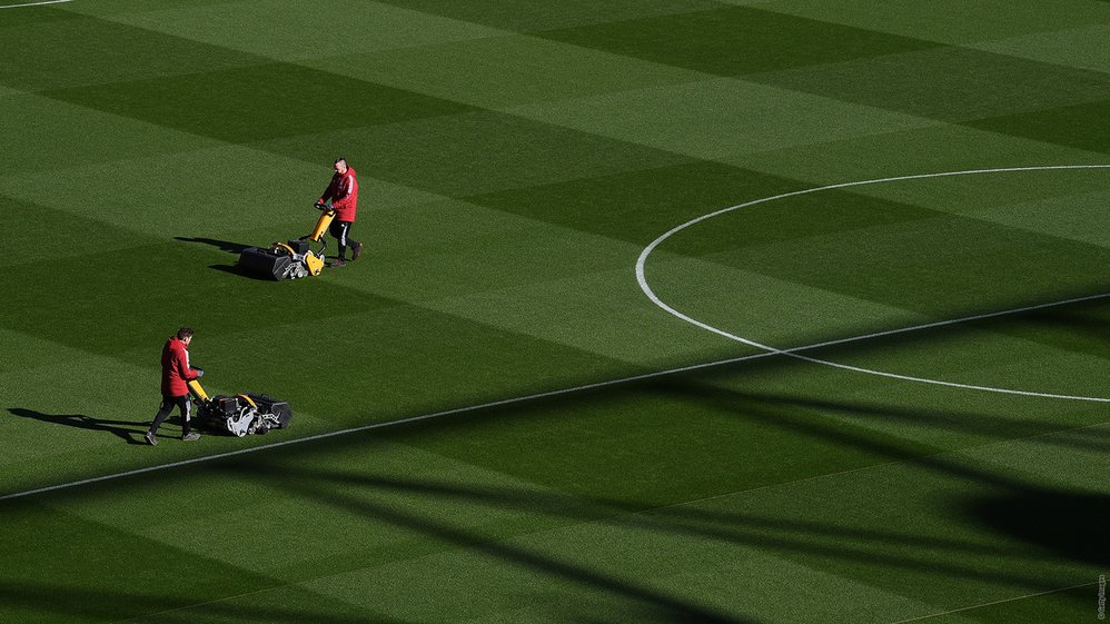 Groundstaff tend to the pitch