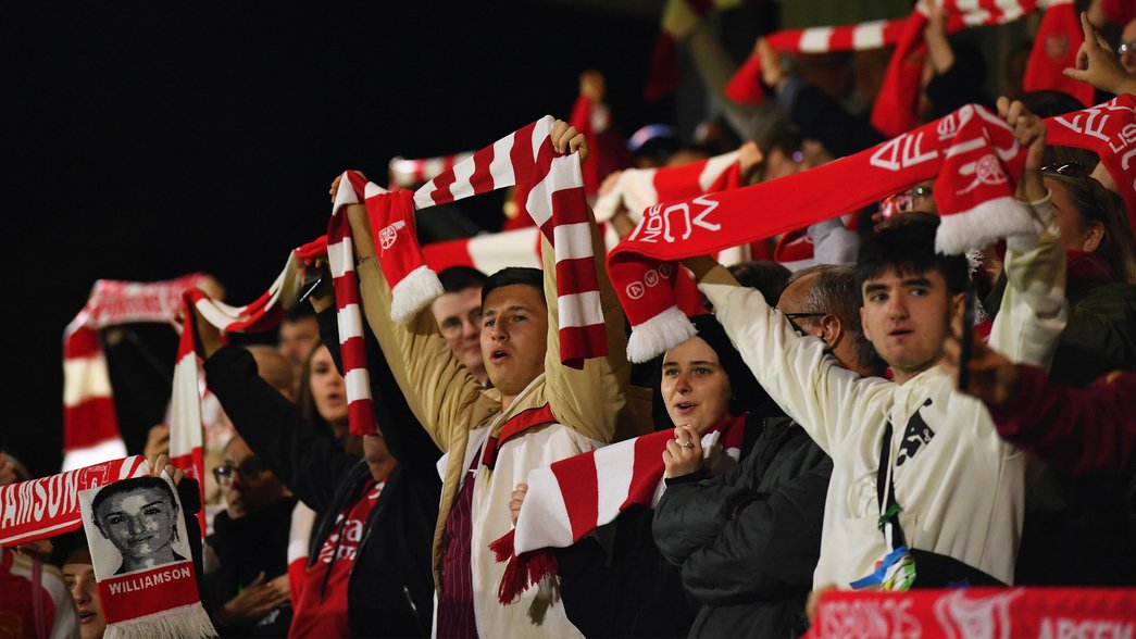Supporters singing at Meadow Park